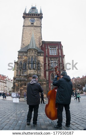 PRAGUE, CZECH REPUBLIC - February 2nd, 2014 - Swing jazz band play songs on Old town square. Look from behind