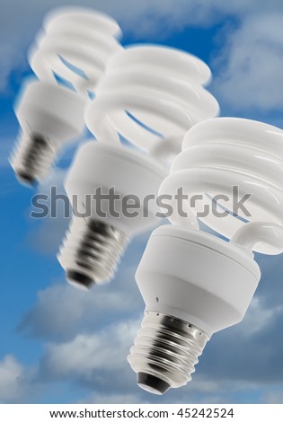 Environment friendly lamps on the blue sky background