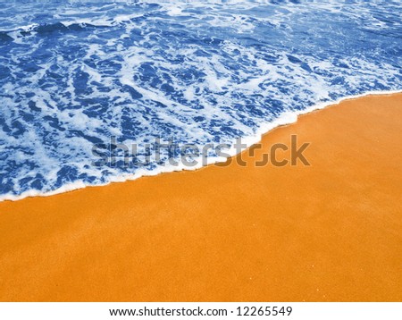 Blue waves on the gilded sand ( High intensity of color)