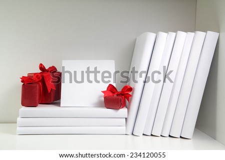 Bookshelf and books in white color, card with pace for text and gifts