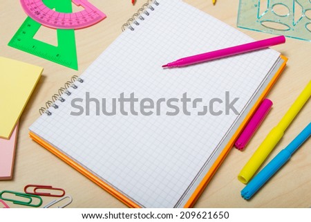 Office of the bright lies next to a notebook on the desk student