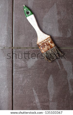 Background Construction tiling at home, tile floor adhesive brush violet