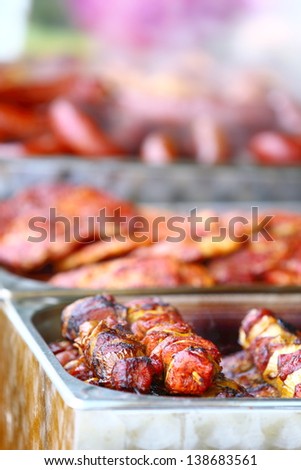 barbecue dinner skewers shish kebab and other meat on BBQ