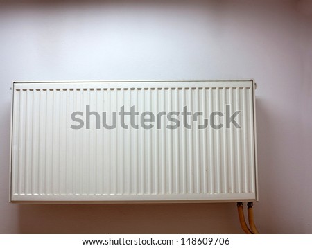 central heating radiator conceptual of increasing costs of energy