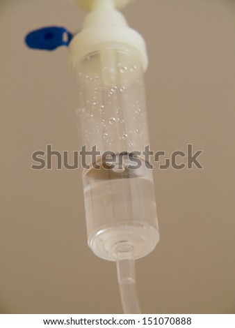 Infusion bottle with IV intravenous solution in hospital