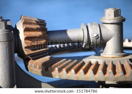 Close up steel cog wheels metal gears mechanical ratchets machine part, industry detail