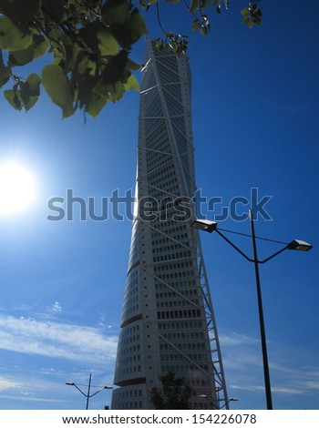 Malmo Sweden AUGUST 7,Turning Torso skyscraper on August 7, 2013 in Malmo Sweden. Designed by Santiago Calatrava, it is the most recognized landmark of Malmo today.