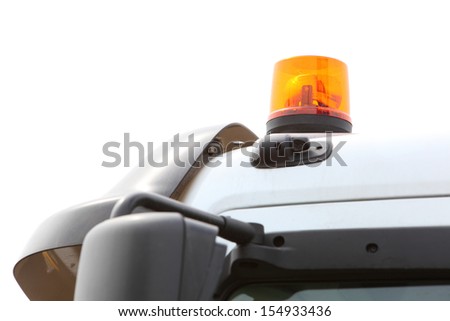 Orange siren signal lamp for warning, flashing light on vehicle, industry detail