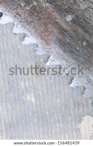close up tool detail of crosscut saw blade in construction site