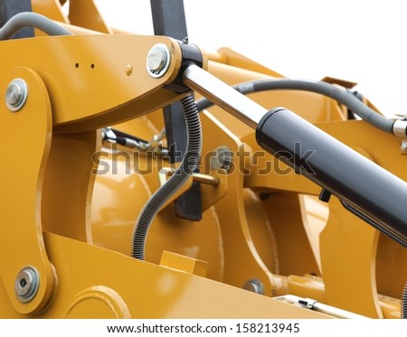 Detail of hydraulic bulldozer piston excavator arm construction machinery white background Detail of hydraulic bulldozer piston excavator arm construction machinery white background