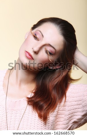 Autumn woman fashion female stylish creative make up false long brown eye lashes autumnal colour. Close up portrait
