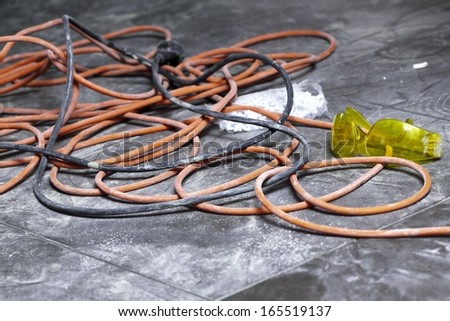 Cable Power Cords In A Tangled Mess On Floor Workplace