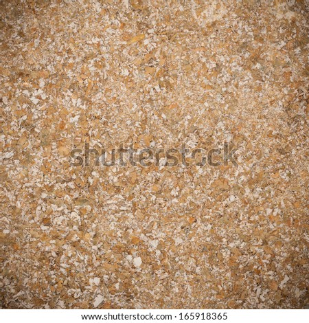 Close up of bran as beige food background or grain texture. Diet and healthy nutrition. Square format.