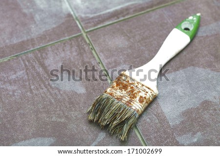 Background Construction tiling at home, tile floor adhesive brush violet