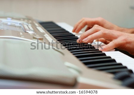 hands playing music on the piano, hands and piano player, keyboard