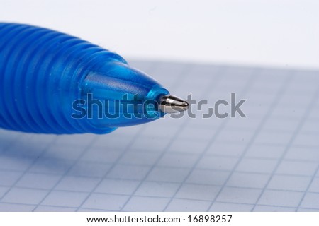 empty page of notebook and blue pen, ballpoint isolated on white