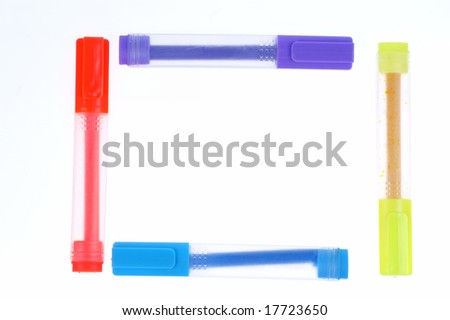Colorful markers over a white background.