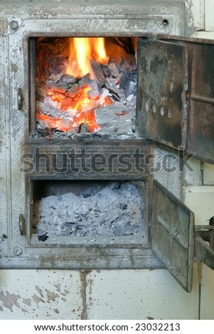Old fireplace and door, stove, fire