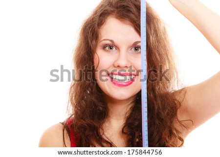 Happy weight loss young sport fitness woman girl with measure tape isolated. Diet. Studio shot.