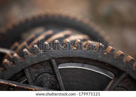 Close up steel cog wheels metal gears mechanical ratchets machine part, industry detail
