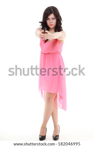Full length sexy detective spy woman brunette holding gun isolated on white background
