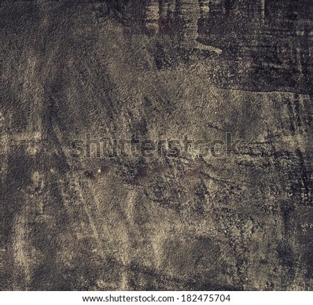 Closeup of grunge black metal plate as background or texture. Square format.