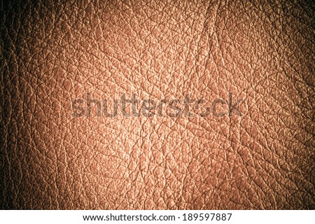 Brown leather texture closeup grunge background. Country western background, cowboy rawhide design, abstract pattern