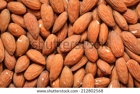 Healthy food, good for heart health.  Almonds as background.