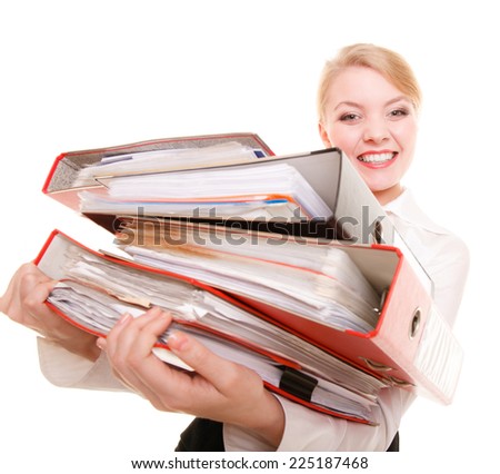 Business and paperwork. Young smiling businesswoman holding stack of folders documents. Busy woman working in office.