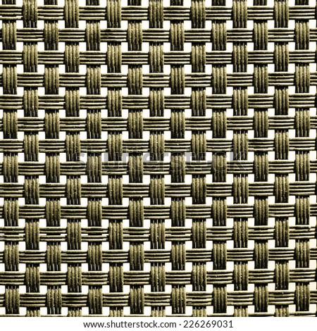 Closeup of black plastic weave as woven background texture or pattern. Square format.