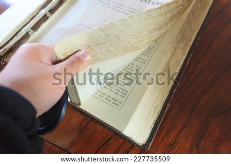 BIBURY, ENGLAND, UK - SEPTEMBER 21, 2014: Old Holy Bible in St Mary Parish Church inside in Bibury in Cotswold district on September 21, 2014, England.