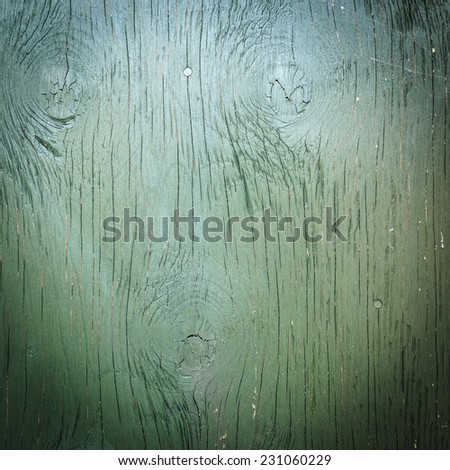 Old green grunge wooden surface background or texture. Square format