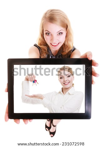 Real estate agent businesswoman showing ipad with photo of woman with keys. Happy blond girl holding tablet touchpad dreaming about own home. Isolated. Technology and accommodation.