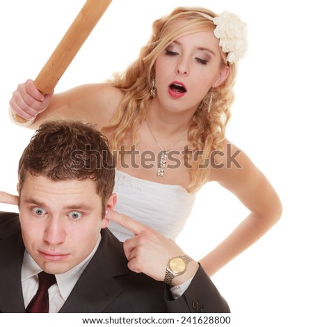 Wedding couple having argument - conflict, bad relationships. Angry woman fury bride holds rolling pin in fight with groom. Isolated