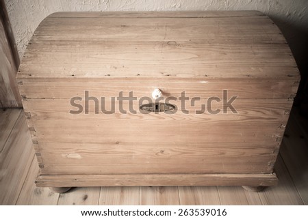 Retro style. Old wooden chest like treasure box in the attic. Interior.