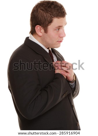 Facial expression body language. Desperate young man showing clasped hands asking forgiveness, praying isolated