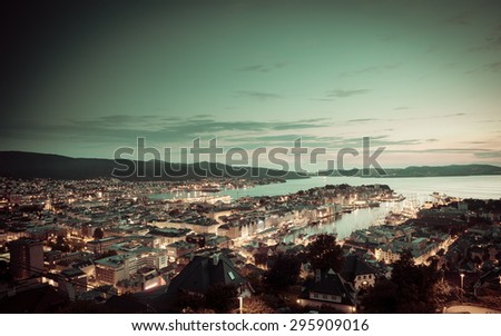 BERGEN, NORWAY - JULY 26, 2014: Panoramic view from hill of Bergen and fjord landscape sunset scenery durig The Tall Ship Races on July 26, 2014, Norway