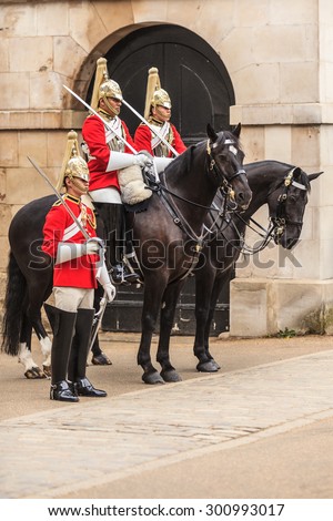 LONDON, ENGLAND UK - SEPTEMBER 20, 2014: Royal horse guards at the Admiralty House on September 20, 2014, England.