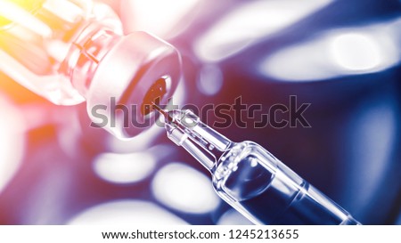 Medication drug needle syringe drug,medical Vaccine vial hypodermic injection treatment disease care in hospital and prevention illness.selective focus.