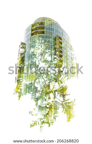 Green Building - In-Camera Double Exposure of a New High-Rise Growing from a Green Tree