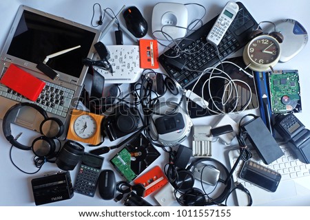 Pile of used Electronic Waste on white background, Reuse and Recycle concept, Top view