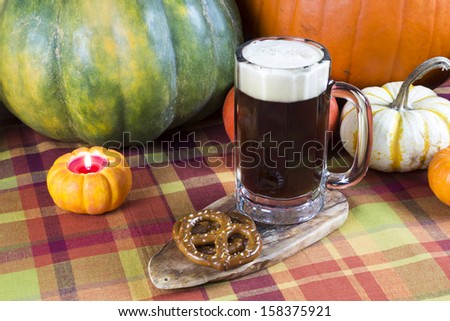 oktoberfest harvest beer mug with fall seasonal decoration