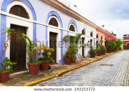 Side view of a charming cobblestone street with colonial architecture in San Juan, Puerto Rico
