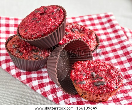 Creative and colorful, home baked and grain free are these red beetroot muffins with dark chocolate.  Baked in silicon muffin forms.