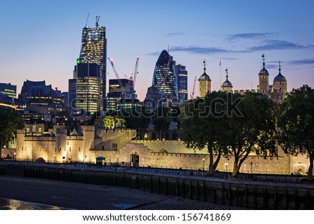 London tower and skyscrapers on a summer night