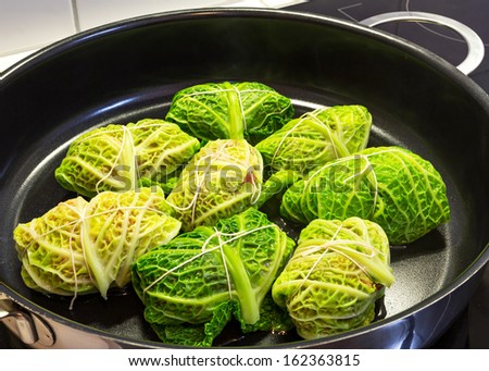 Traditional german food. Filled savoy cabbage with meat inside.