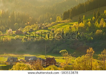 Colorful landscape with village and mountains. Carpathians, Ukraine.
