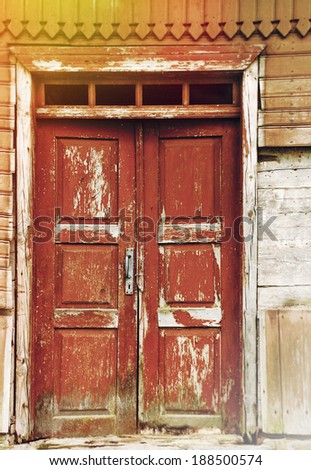 old rural wooden village door in the countryside