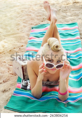 happy cute hot body young woman lying on the beach with colorful details, relax concept, travel