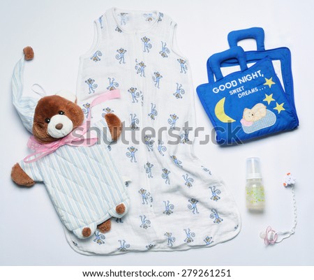 top view set of fashion trendy nighttime stuff and toys for newborn baby, baby fashion concept